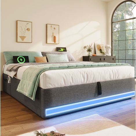 Lit capitonné moderne 140x200 cm en lin gris, avec LED, USB et Type-C, coffre hydraulique et poches latérales
