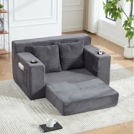 Sofá puff de 151x133x64 cm con bolsillos laterales y 2 cojines, pana gris (1/5)