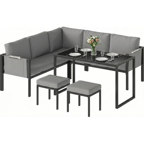 Terrasse ordonnée avec salon de jardin d'angle 6 pièces gris, poches d'accoudoir, table haute et repose-pieds (1/5)