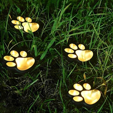 Paquete de 4 luces solares para jardín con forma de huella de pata - IP44 Impermeables para caminos y patios, luz blanca cálida (1/5)