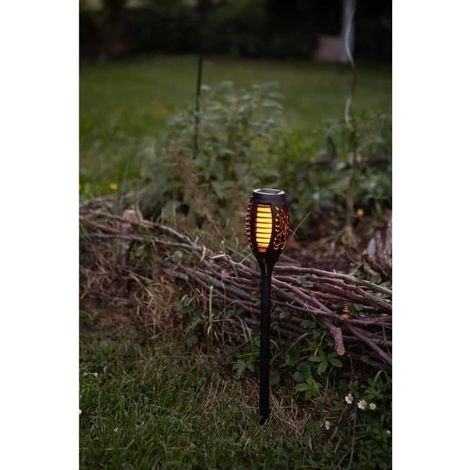 Torche solaire à LED vacillante 70cm, flamme sans danger, Résine noire ajourée, ambiance chaleureuse (1/3)