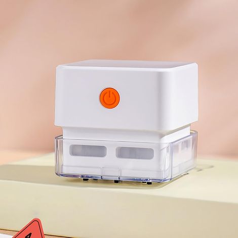 Wiederaufladbarer Handstaubsauger für Tastaturen und Schreibtische (1/5)