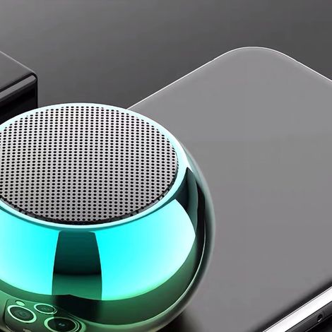 Enceinte Bluetooth sans fil multifonctionnelle avec caisson de basses en métal, portable et idéale pour les voyages et la maison (orange). (1/5)
