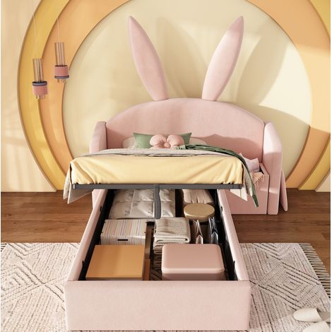 Cama infantil tapizada rosa 90x200 cm de terciopelo, con cabecero de orejas de conejo, arcón hidráulico y mesita