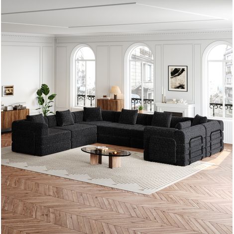 Sofá cama modular de chenilla negro con compartimento en el reposabrazos y estructura metálica (1/5)