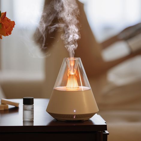 Este humidificador ultrassónico de névoa fria com infusão de fragrância é adequado para salas de estar residenciais e escritórios. (1/3)