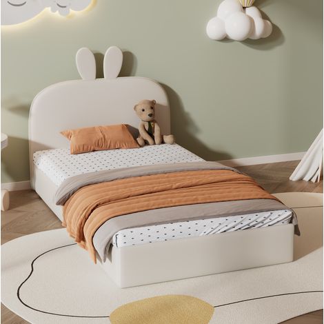 Cama infantil tapizada de terciopelo beige 90x200 cm con cabecero de conejo y somier de láminas de madera (1/5)
