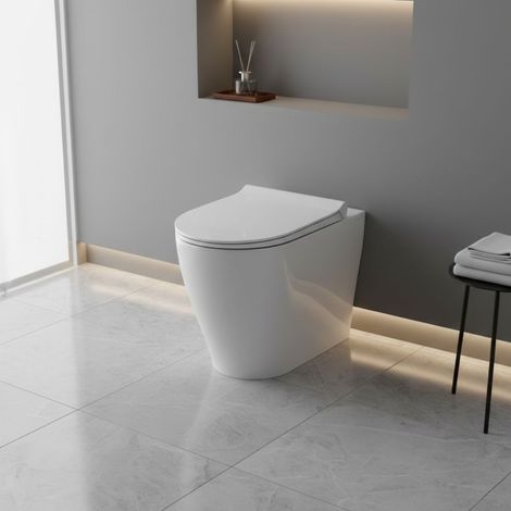 WC filomuro in ceramica bianca con scarico a vortice e fissaggi nascosti 36x55 cm – Mirto Round  Ceramica Dolomite