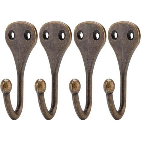 Quattro appendiabiti in bronzo antico, adatti sia per il soggiorno che per la camera da letto. (1/5)