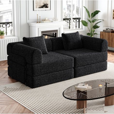 Divano letto modulare nero in ciniglia con vano portaoggetti nel bracciolo e configurazione versatile (1/5)