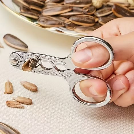 Outil pratique pour écaler les graines de tournesol, idéal pour les personnes paresseuses, également pour ouvrir les pignons de pin et les noisettes, pince à graines de melon (1/4)