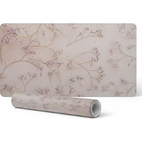 Alfombrilla protectora de escritorio con delicado estampado floral sobre fondo de 120x60 cm.
