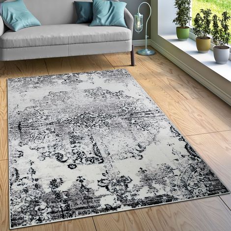 Paco Home – Tapis shaggy vintage noir et blanc 60x100 cm – 100% polypropylène – Épaisseur 8 mm – Résistant et adapté au chauffage au sol (1/4)
