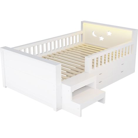 Cama infantil 90 x 200 cm blanca con cabecero de estrellas y luna, cajones, escalones y LED (1/5)