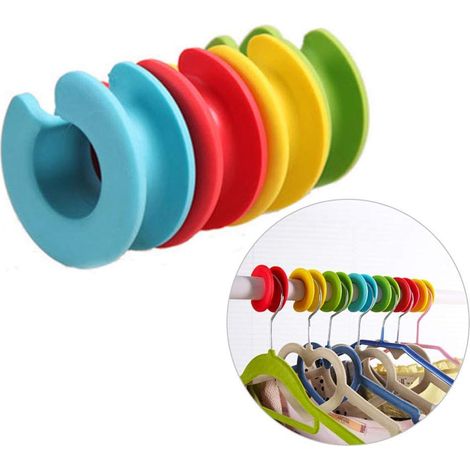 Juego de 8 ganchos antideslizantes de silicona para perchas de ropa. (1/5)