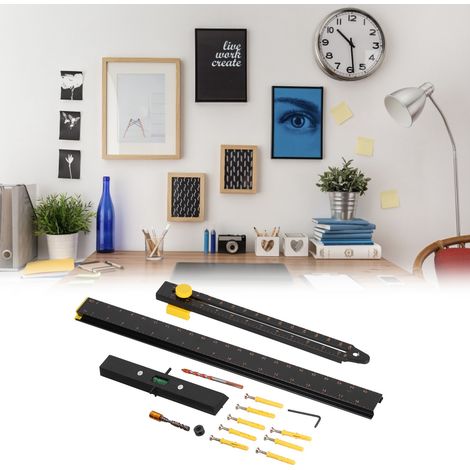 Kit de perçage et de positionnement domestique pour cadres photo (1/5)