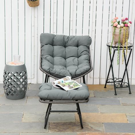Outsunny Gartenstuhl mit Fußstütze aus epoxidbeschichtetem Metall und Kunstharz in Rattanoptik mit weichen Kissen – Grau
