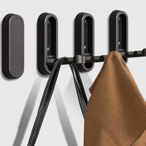 Ein Set aus 4 faltbaren Wandhaken zum Aufhängen von Mänteln, Handtüchern, Kleiderbügeln, Hüten und Rucksäcken (schwarz). (1/5)