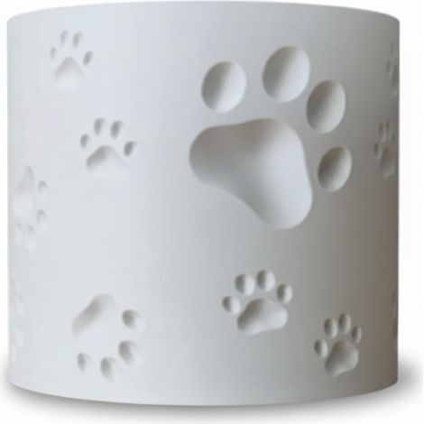 Un moderno vaso per piante bianco a forma di zampa di animale.
