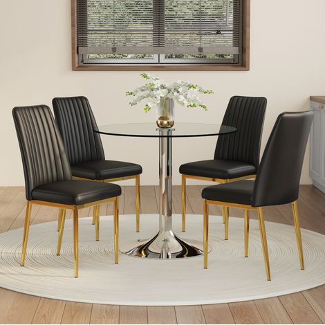 Conjunto de comedor con mesa redonda de cristal 85x76 cm y 4 sillas de PU negro, base plateada y patas metálicas doradas (1/5)