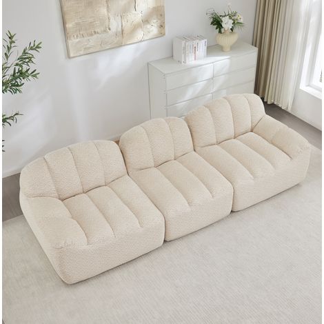 Canapé modulable 3 places en tissu polaire granulé beige blanc, avec ottoman, sans structure rigide (1/5)