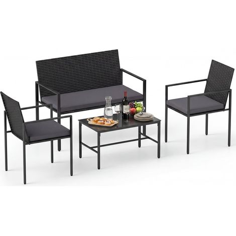 Conjunto de muebles de exterior de ratán de 4 piezas con cojines.