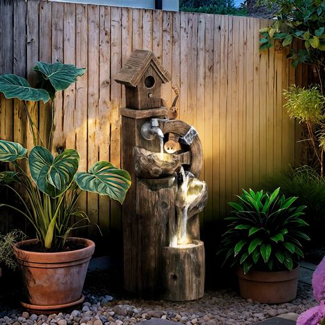 2-in-1-Wasserfallbrunnen mit Vogelhaus, LED-Beleuchtung und Pumpe – Besonderes Gartenelement mit mehrfarbigen Holzscheiten