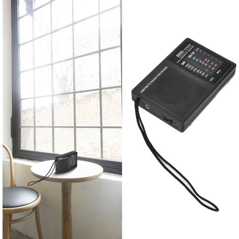 Mini radio portátil FM/AM con auriculares externos. (1/5)