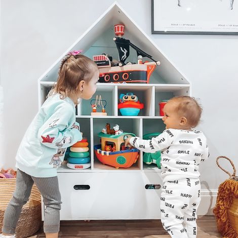 Bibliothèque/meuble de rangement pour jouets blanc avec étagères cubiques, idéal pour les chambres d'enfants et d'adolescents. Disponible en deux couleurs : bleu et rose. Dimensions : 82 x 30 x 126 cm