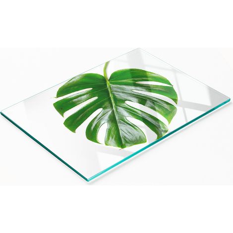 Tabla de cortar y servir decorativa de vidrio con hojas tropicales 80x52 cm