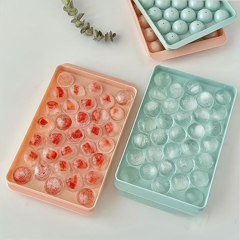 Vassoio rotondo in plastica per cubetti di ghiaccio, ideale per congelare cioccolato, frutta e bevande. (1/5)