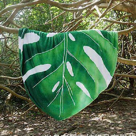 Couverture en flanelle à motif de feuilles, multifonctionnelle, idéale pour les pique-niques et le bureau. (1/5)