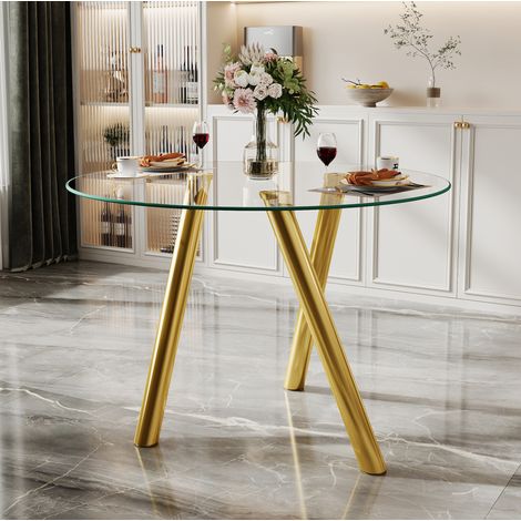 Mesa de comedor redonda 89x89x76 cm dorado en metal con vidrio templado y bordes redondeados (1/5)