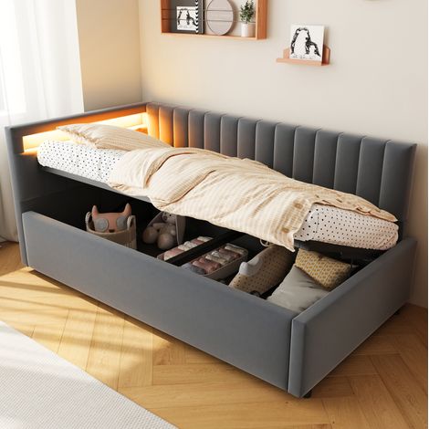 Letto imbottito daybed classico 90x200 cm in velluto grigio, con testiera laterale reversibile, LED e vano contenitore idraulico (1/5)