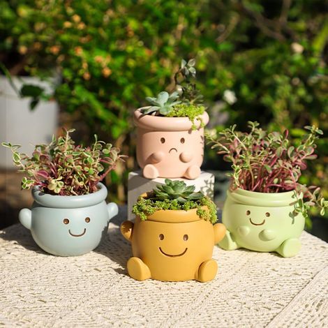 Cute smiley face flower pot, small resin human head flower pot, suitable for indoor plants, fun smiley face flower pot, succulent plant pot, a good choice for birthday and Christmas gifts (pink). (1/4)