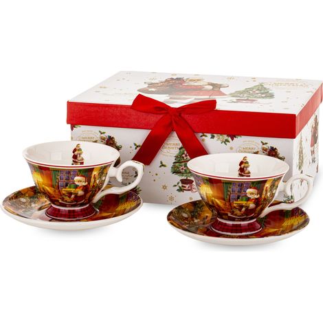 Tazas de porcelana navideñas con Papá Noel en una caja de regalo decorativa.
