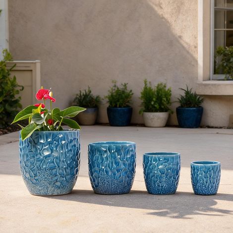 Set de 4 pots de fleurs en céramique bleue avec relief martelé (1/5)