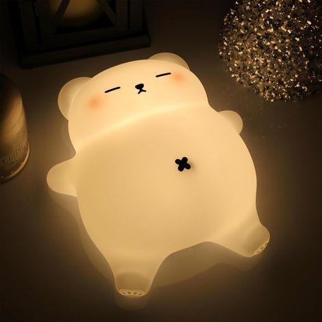 Une veilleuse ours ronfleur avec un ventre mobile, en silicona, recargable por USB, et qui ronfle même (1/5)