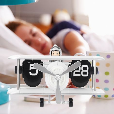 Orologio a ribalta da 12 ore a forma di aeroplano - Plastica bianca 215x212 mm - Batteria AA inclusa - Design retrò con ribaltamento automatico (1/4)