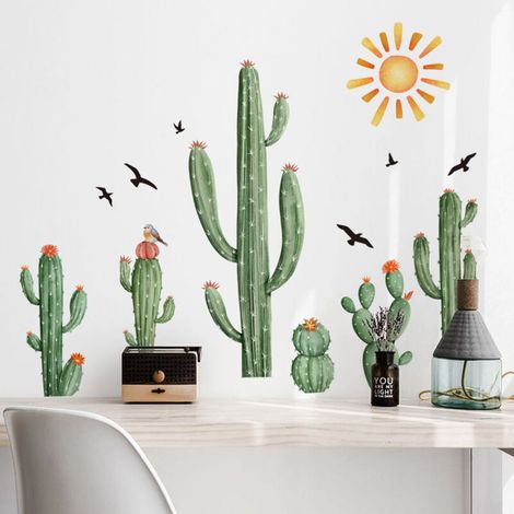 Un set di adesivi murali raffiguranti cactus, sole e uccelli.