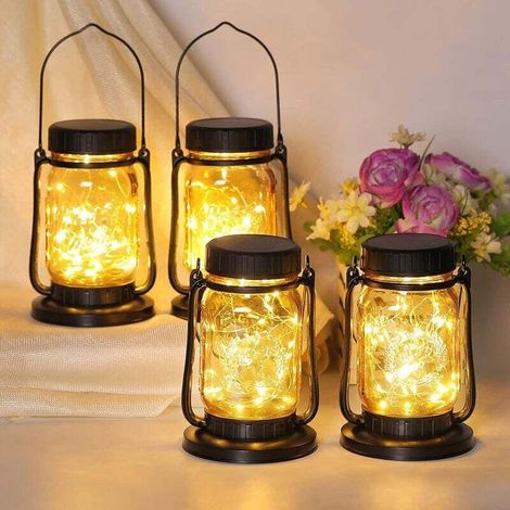 Set di 4 lanterne solari da esterno, luci solari da appendere, lanterne solari in metallo e vetro con design ad angelo, impermeabili, decorazione natalizia solare da giardino per patio, prato, cortile (1/5)