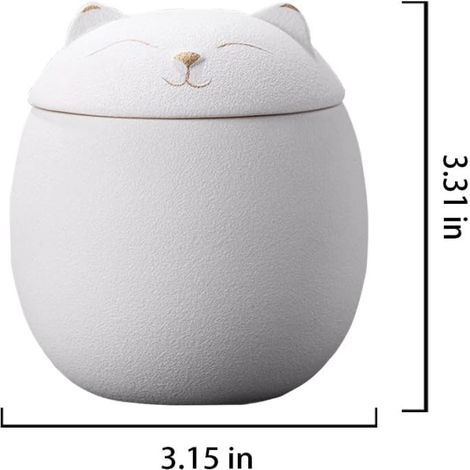 pequeña urna de cerámica blanca con forma de gato