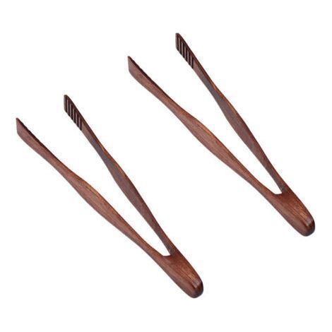Les pinces de cuisine en bois, adaptées pour les grillades, etc., peuvent également servir de couverts ou de pinces alimentaires (1/5)