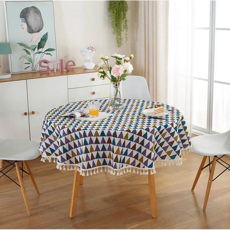 Nappe ronde à pompons de 120 cm de diamètre, en polyester et coton, idéale pour table à manger, table basse ou table de jardin (motif triangles multicolores). (1/4)