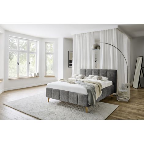 Meise Möbel Stauraumbett Alva 140x200 cm Bettkasten & Lattenrost Bouclé-Stoff Graphit Holzfuß eichefarbig (1/5)
