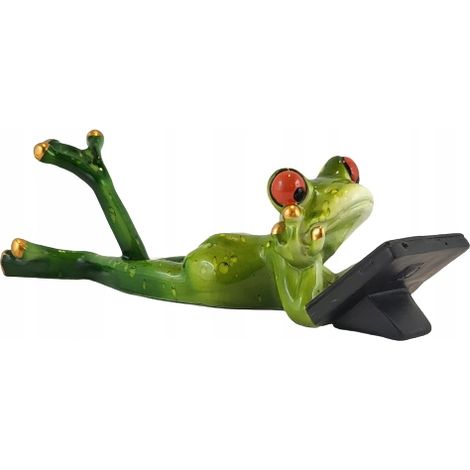 Froschfigur, die mit einer Tafel liegt (1/5)