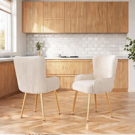 Fauteuil de salle à manger en velours beige avec piètement métal (1/5)