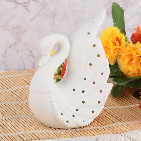 Ravissante lampe décorative en céramique en forme de cygne avec LED, à piles (B), idéale pour une chambre ou une étagère. (1/5)