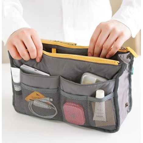 Organisateur de sac gris pour sacs à langer dans... (1/2)