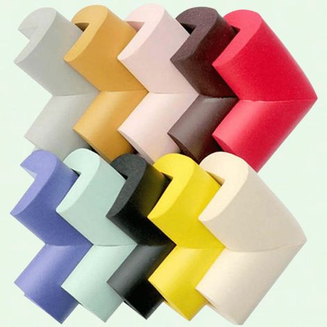 Lot de 4 protections d'angle en caoutchouc gris pour tiroirs, tables et placards. (1/5)
